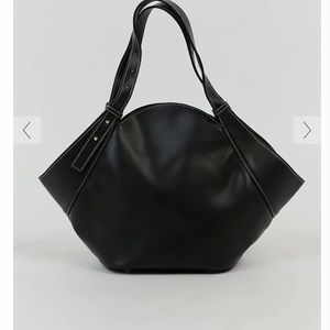 Black wide vegan leather DISSH tote. Look similar to little liffner bag